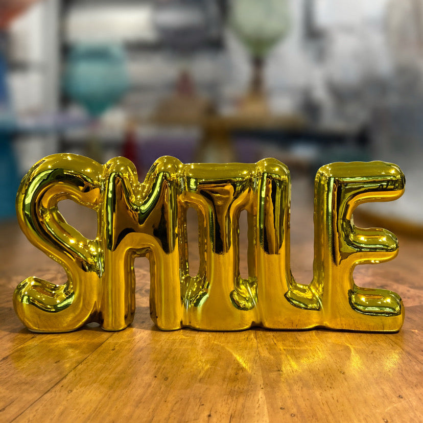 Scritta “smile”